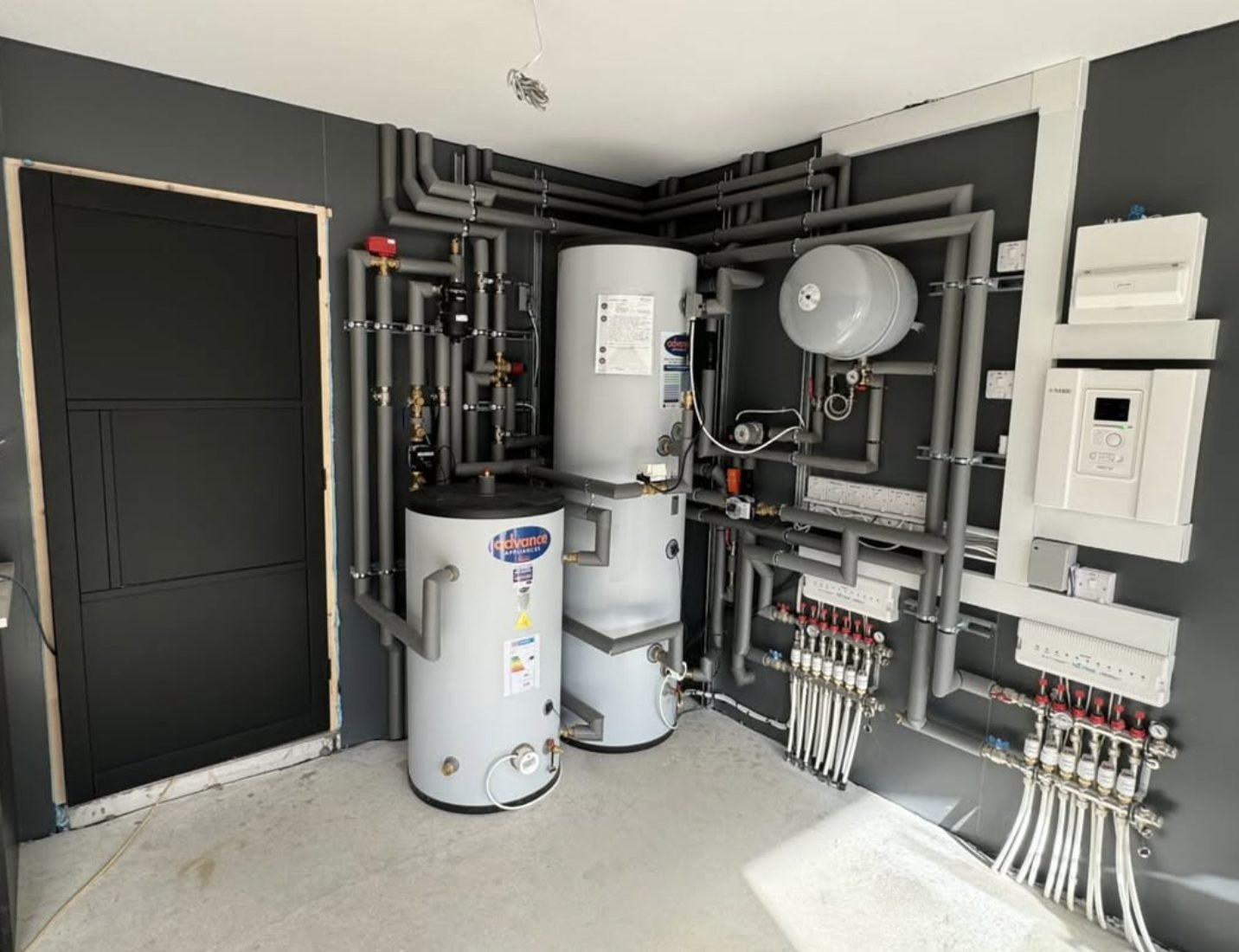 Heat pump plant room installed by NorthStar Air Source Heat Pump Leeds